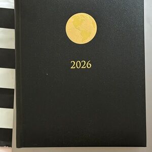 Black 2026 Planner with Gold Globe